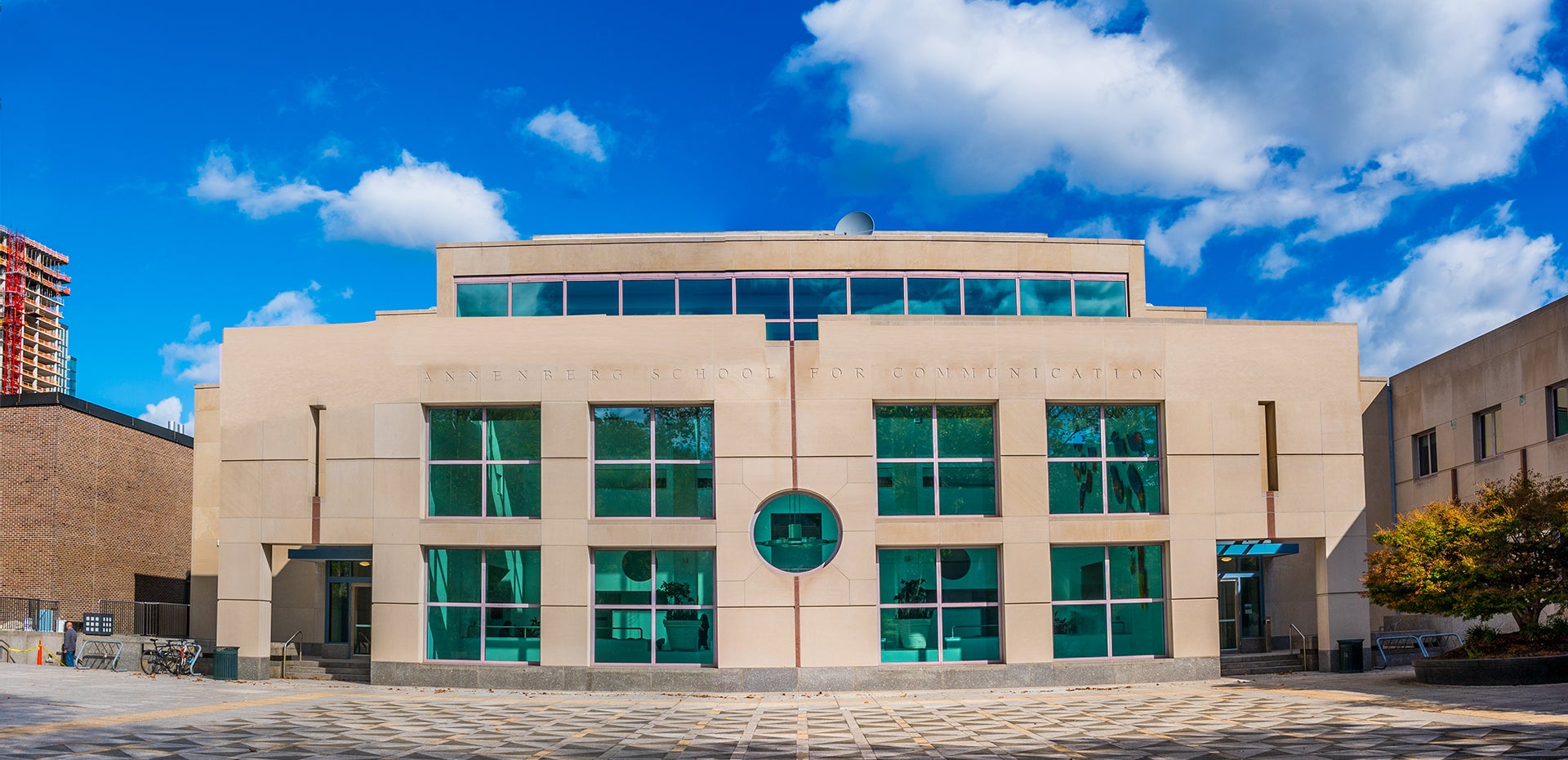 Annenberg Plaza-side facade of the Annenberg School for Communication building against a blue sky