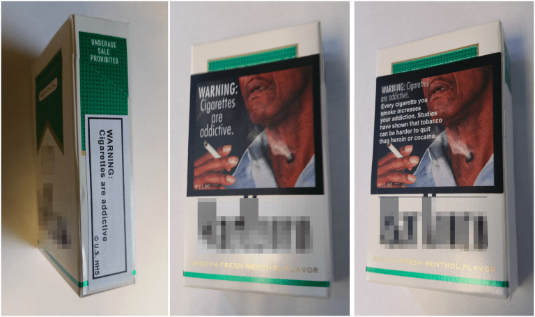Three packs of cigarettes showing both text and pictoral warnng labels