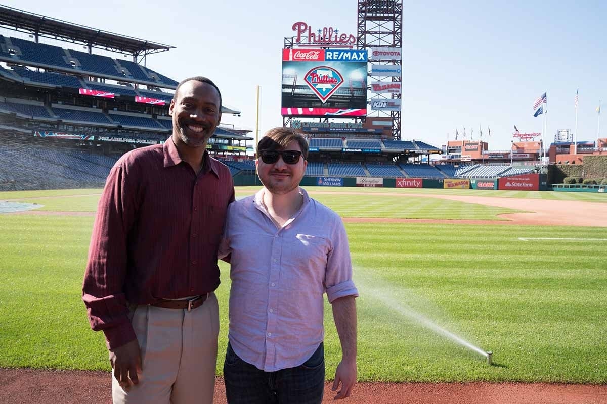 Glanville and Vilanova take a photo on the field at Citizens Bank Park.