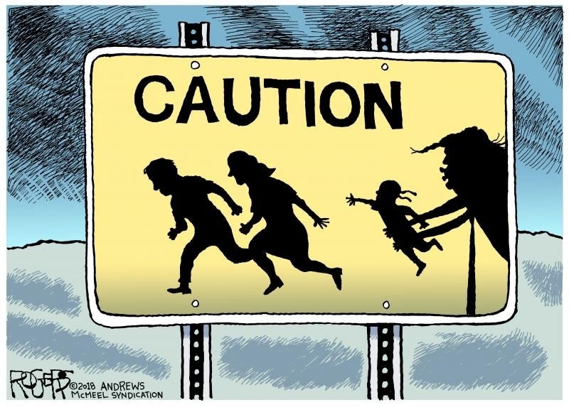 Cartoon of a yellow caution sign with two adult and one child silhouettes running from a monster-like silhouette that facially resembles former President Donald Trump. The child has been caught by the monstrous figure. 
