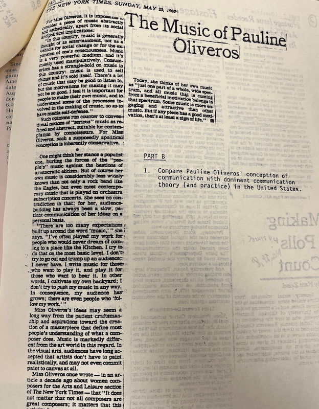 A photo of a paper exam with a question where Schiller incorporated a New York Times interview with composer Pauline Oliveros.