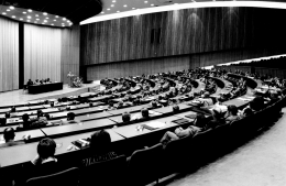 A black and white photo of a full lecture hall