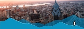 skyline view of a city with a river in sight. in the foreground is a graphic addition of two blue, icy terrains with a penguin standing one to the right, photo credit ActionVance/Unsplash