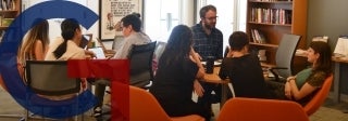 Group seated in an office and having a discussion