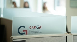 CARGC logo on the side of a cubicle in the office