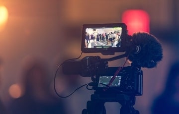 Photo of a camera recording. Photo credit: Kushagra Kevat / Unsplash