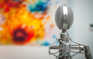 Photo of a microphone. Photo credit: Michal Czyz / Unsplash