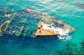 A photo of a destroyed ship under water