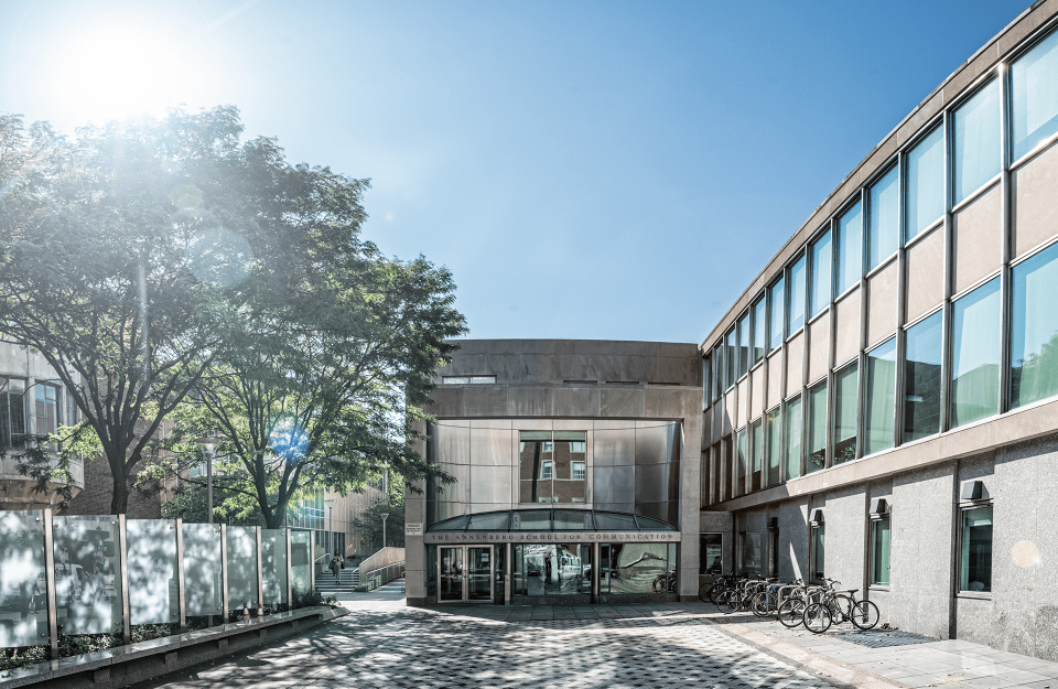 Annenberg School Walnut Street entrance with beautiful blue sky and bright sun