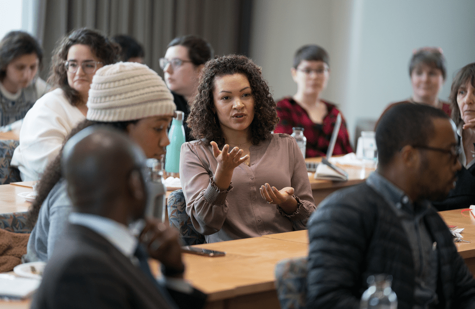 Sarah J. Jackson asking a question during a lecture