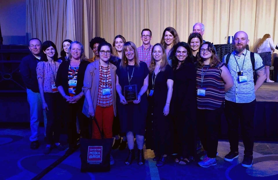 Photo of Barbie Zelizer and her students as she received the Fisher award