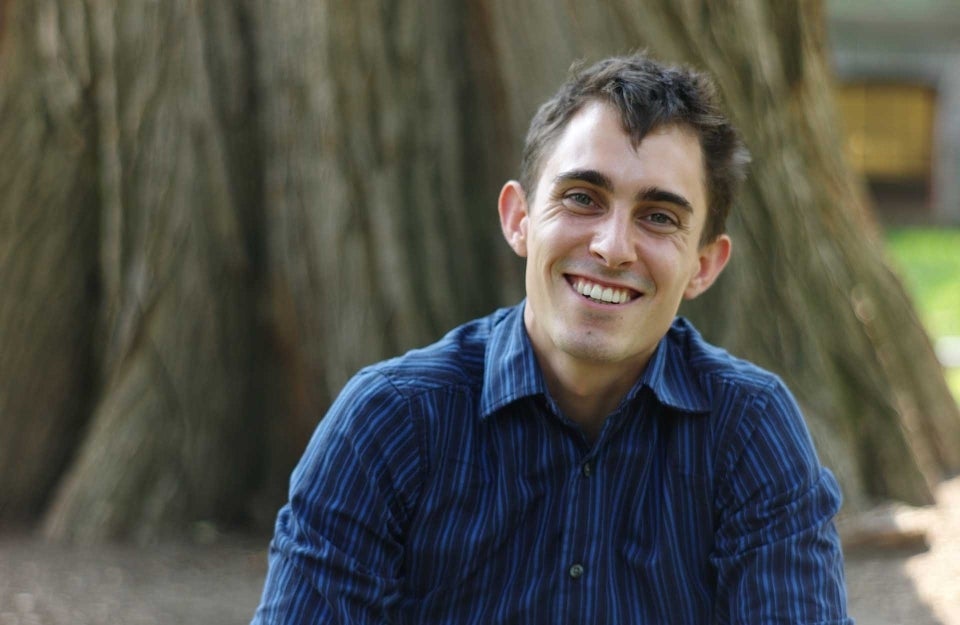 portrait of Douglas Guilbeault in front of tree