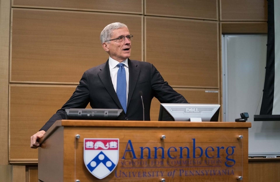 Tom Wheeler stands at Annenberg podium