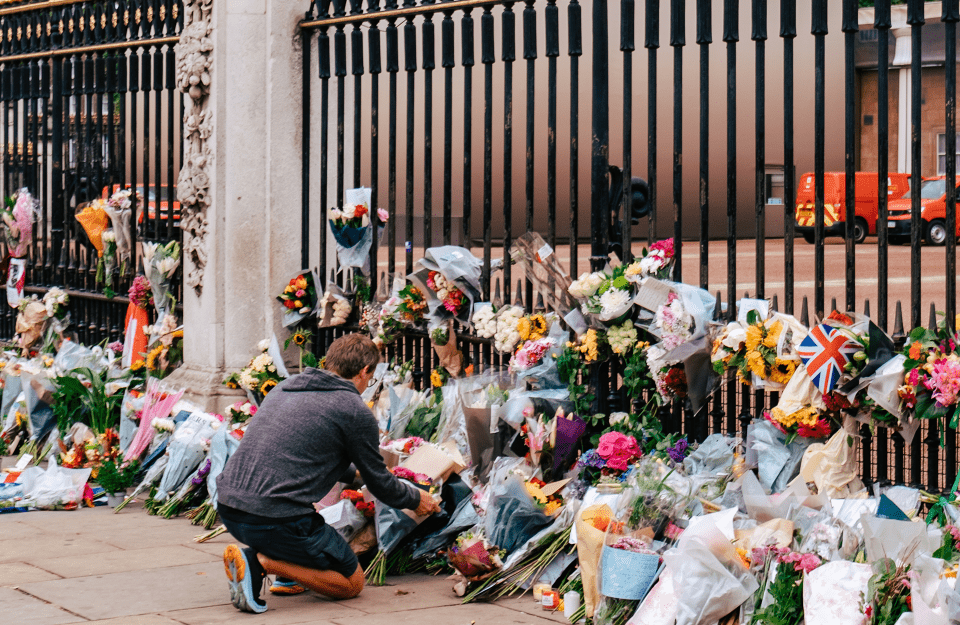 Flowers being laid out in front of Buckingham Palace after the death of Queen Elizabeth II