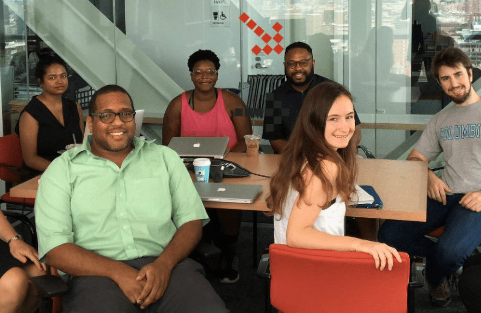 Desmond Patton (back row, center) and Owen Rambow (far right) and the rest of the data science research team who will be working on the ROADS-funded project.