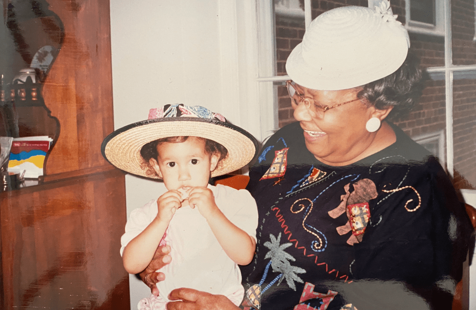 Mary Andrews' great aunt Helen holds a toddler-aged Mary on her lap.