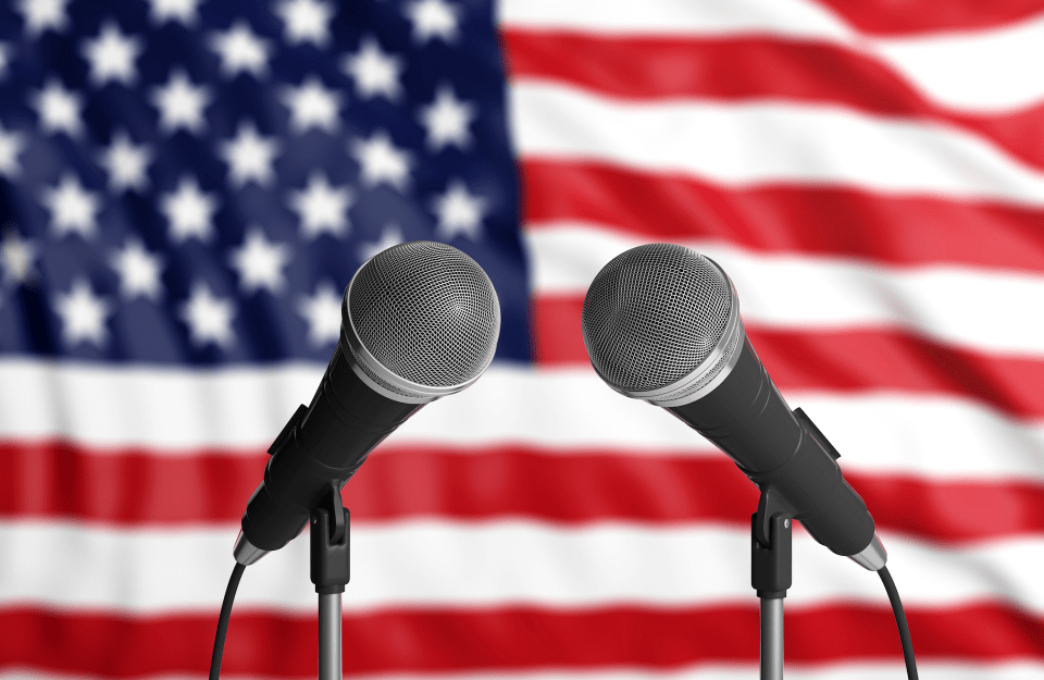 Pulpit with microphones and USA flag in background