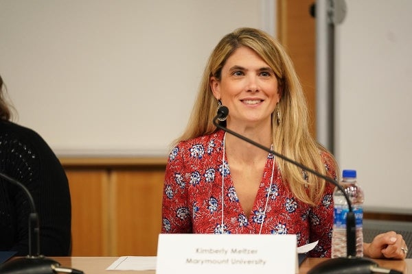 Kimberly Meltzer seated and casually smiling 