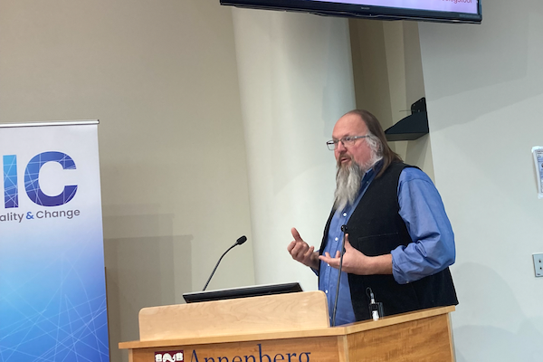 Ethan Zuckerman speaks at a podium