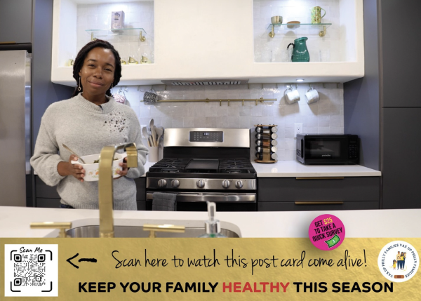 A poster Person standing in a kitchen holding a mug, with text promoting a health message, 'KEEP YOUR FAMILY HEALTHY THIS SEASON', and a QR code to scan for more information